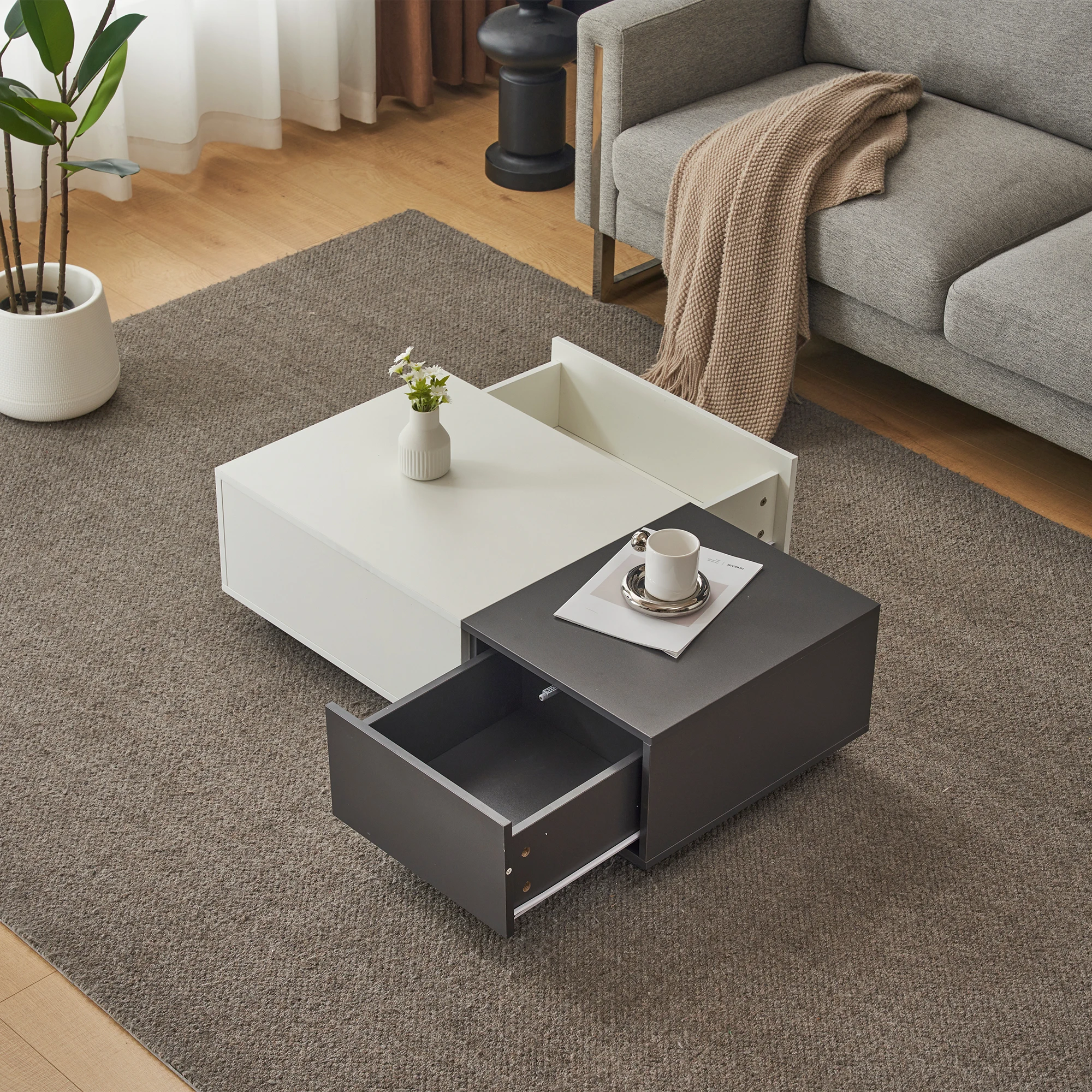 Moderner Couchtisch 100x50x30 cm in Grau-Weiß mit 2 Druckschubladen, innovatives Design, bis 45 kg