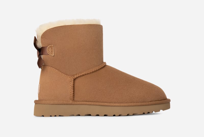 UGG® Mini Bailey Bow II Boot for Women in Brown, Size 6, Shearling/Polyester/Leather