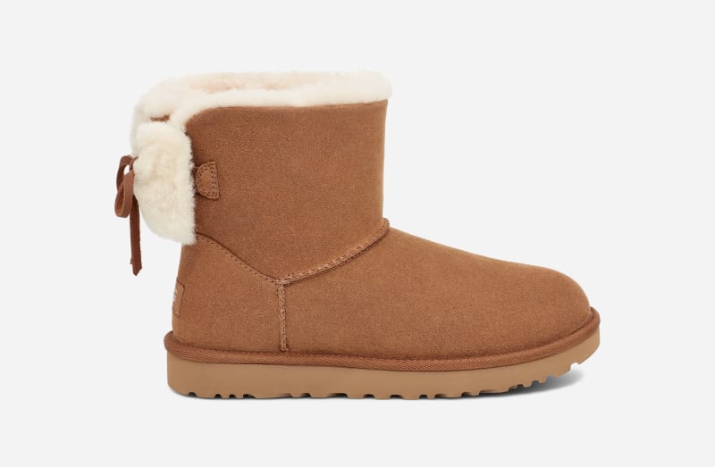 UGG® Classic Double Bow Mini Boot in Brown, Size 9, Leather