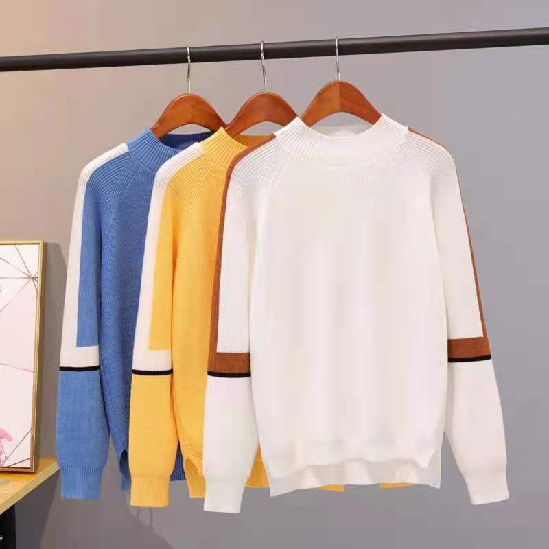 A semi-turtleneck solid skydiving top soft and comfortable knit jumper high and low hem female sweater