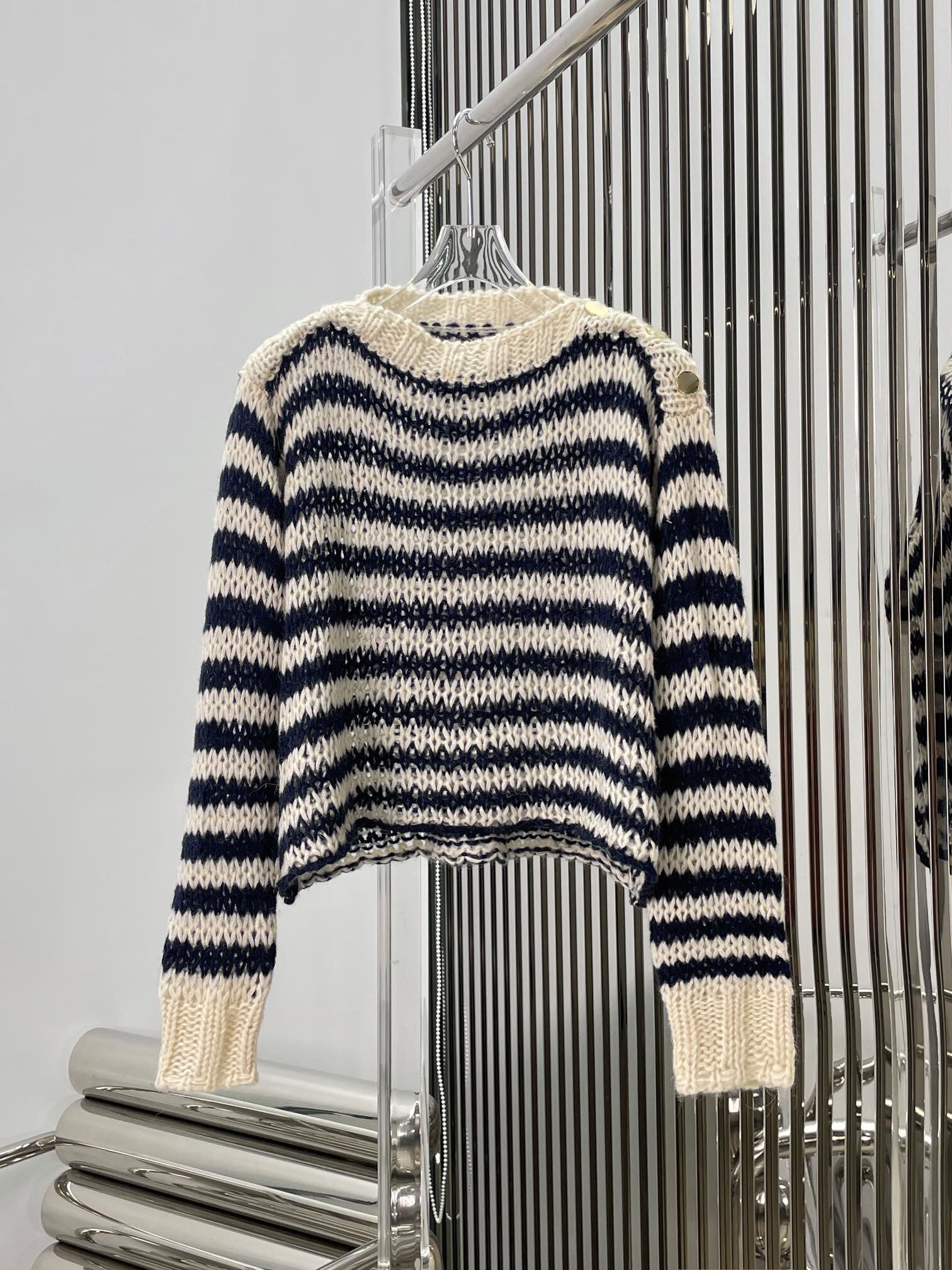 Striped knitted top shoulder button decoration design fabric is soft and comfortable 2023 summer new style