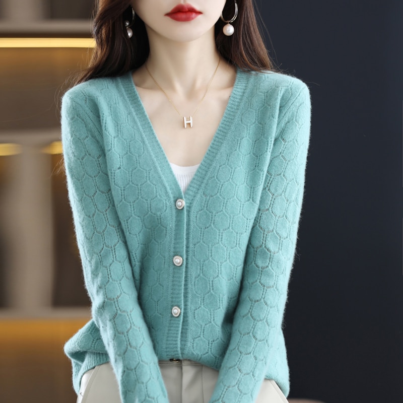 Autumn and winter new 100% wool hollow knit cardigan sweater Joker V-neck classic fashion solid color loose top coat.