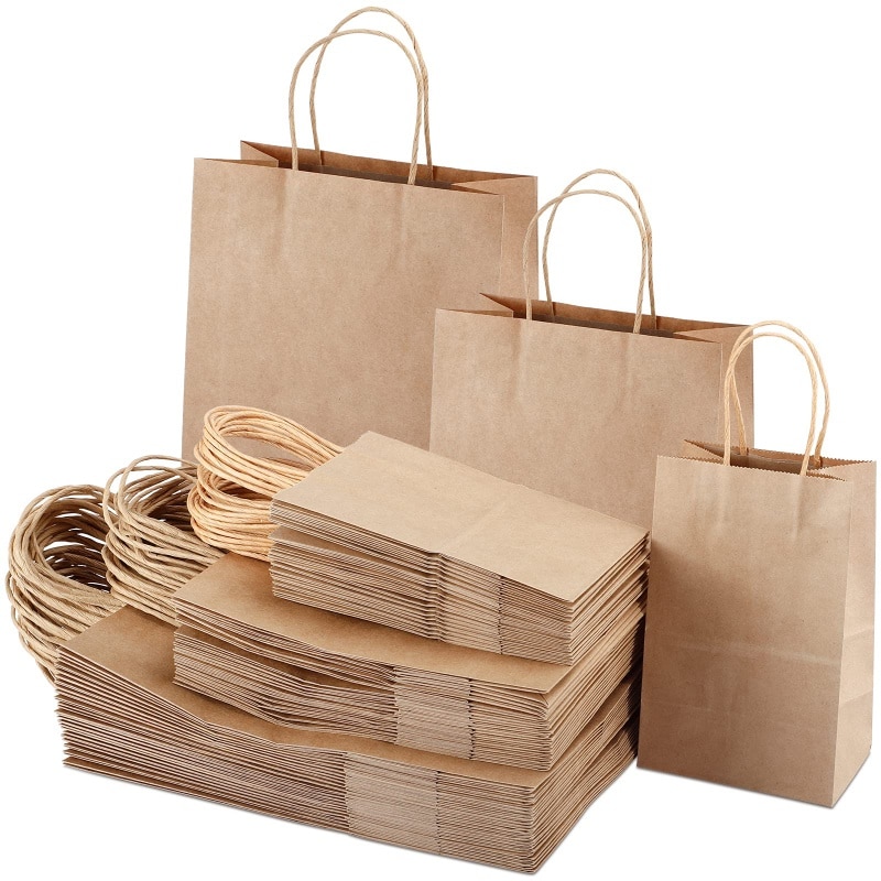 Customized designer Logo Printed Recyclable biodegradable Brown Plain packing Kraft Shopping Paper Bags With logo Twisted Handle