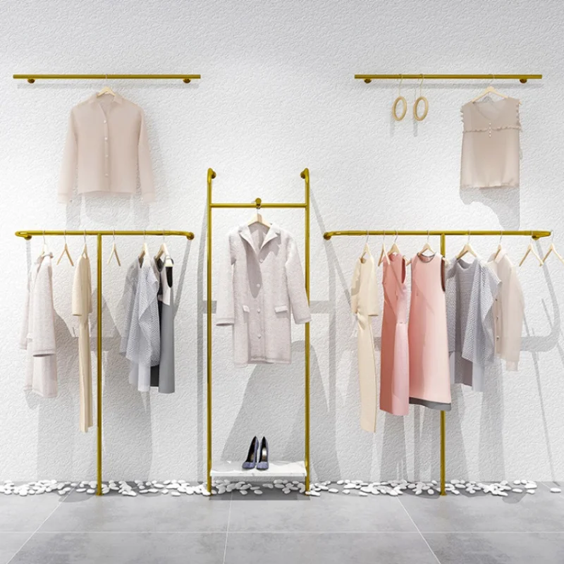 custom，High End Gold Showroom Display Rack Wall Mounted Clothing Racks for Retail Shop