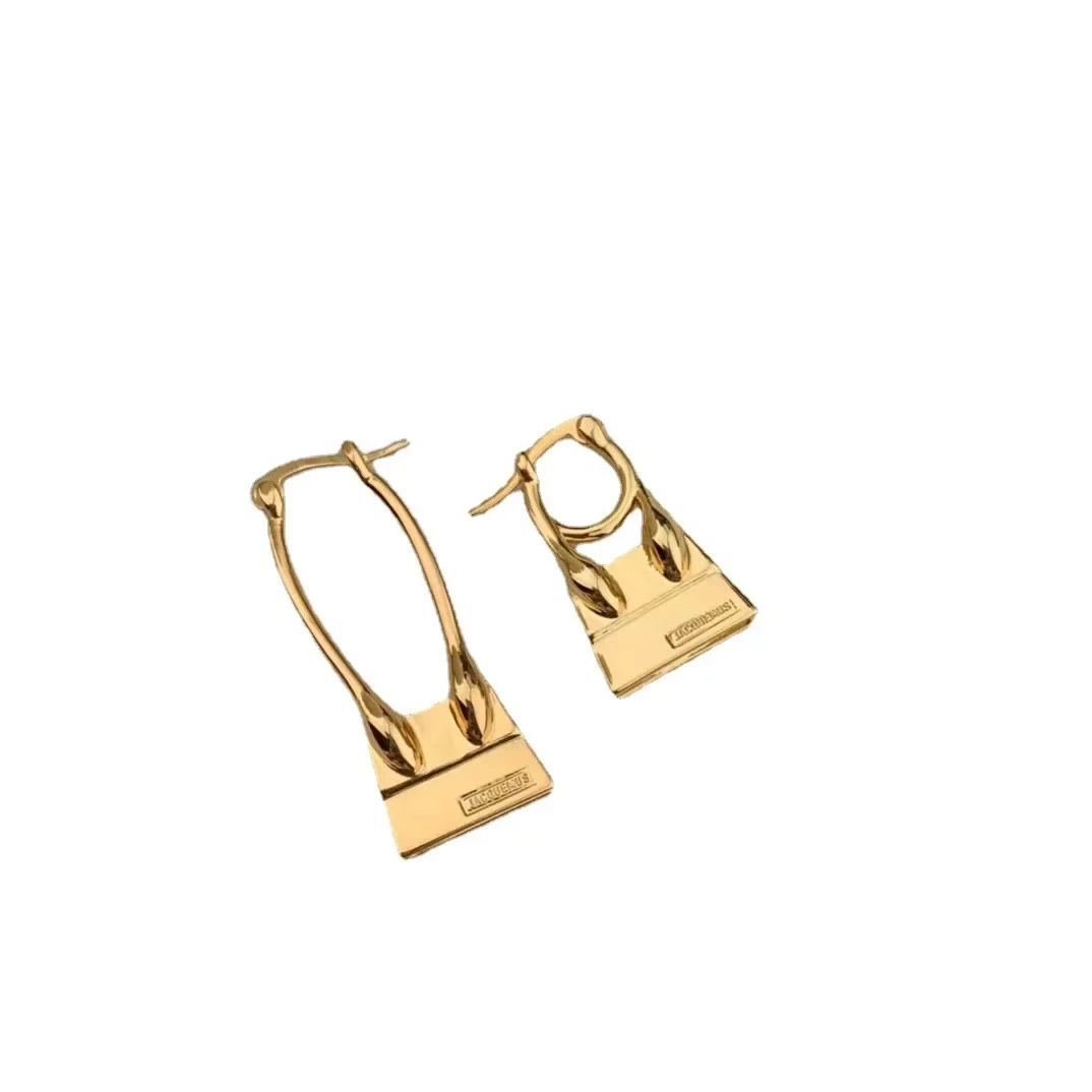 Women Brass Les Creoles Chiquito Noeud Asymmetrical Chiquito Noeud Earrings.